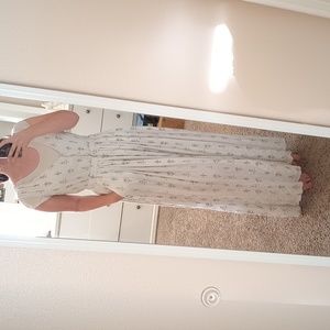 White, low neck dress